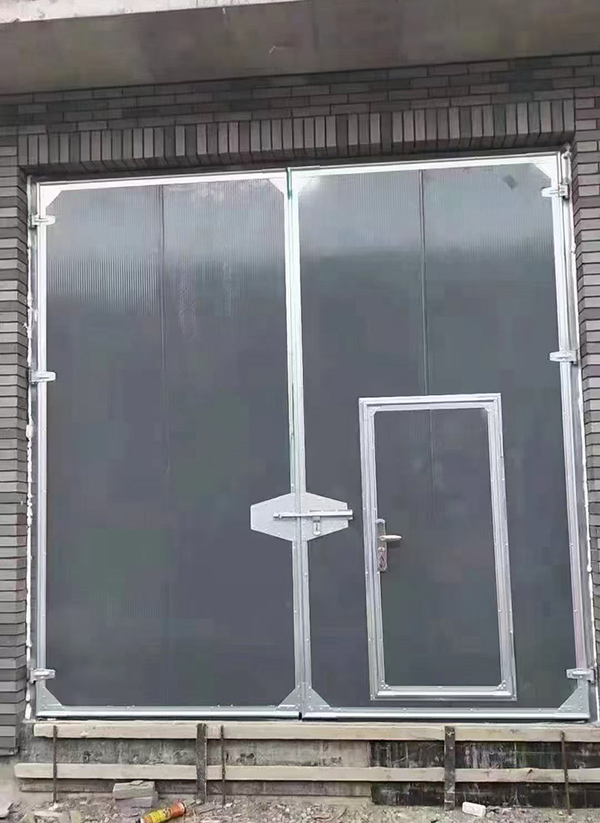 伊宁县工业平开门在大型设备制造车间的应用实例